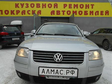Капот Volkswagen Passat после ремонта